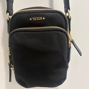 Nearly new Tumi crossbody bag